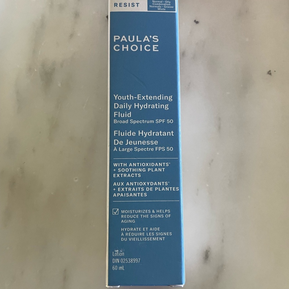 ((NEVER OPENED)) Paula's Choice Youth-Extending Daily Hydrating Fluid SPF 50